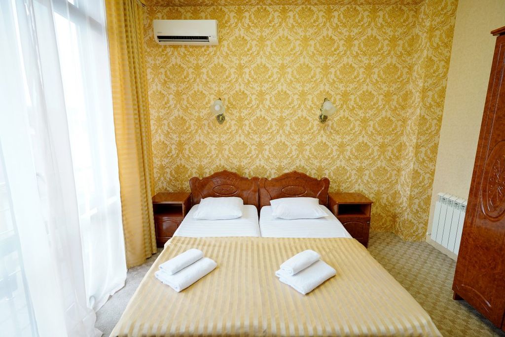 Двухместный номер с 1 кроватью или 2 отдельными кроватями стандарт