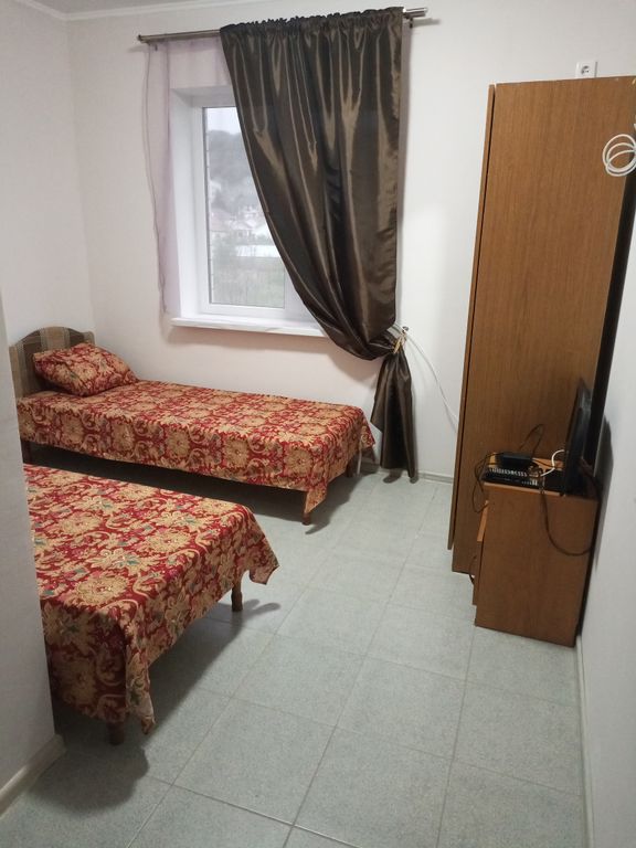 Двухместный номер с 2 отдельными кроватями с душем