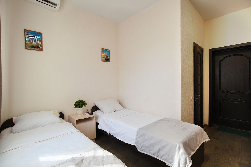 Двухместный номер с 2 отдельными кроватями стандарт