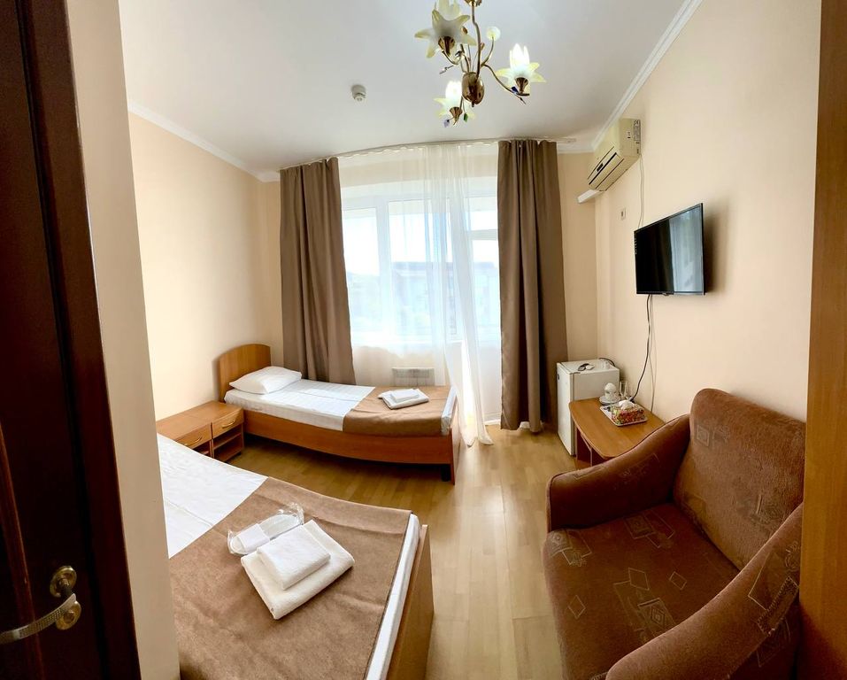 Двухместный номер с 1 кроватью делюкс улучшенный до 3х человек с видом на море