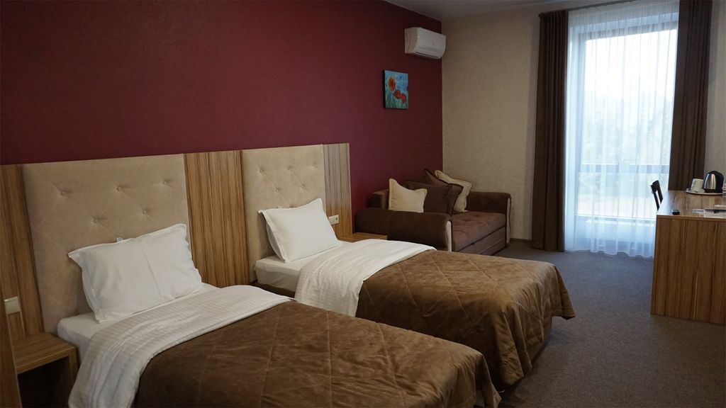 Двухместный номер с 2 отдельными кроватями улучшенный