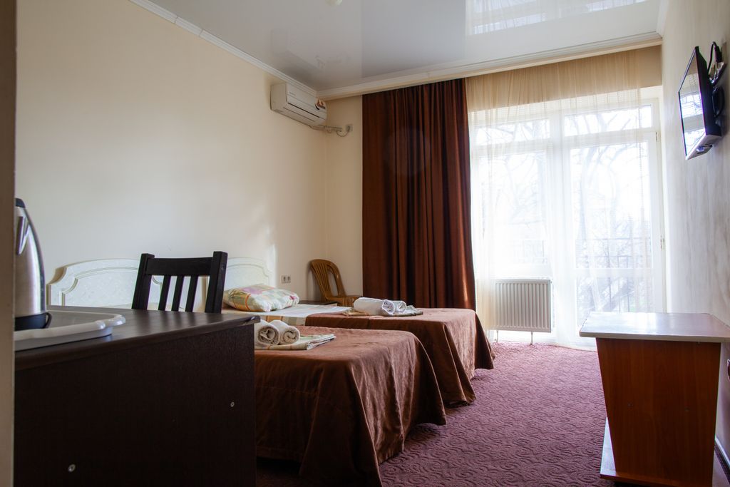 Двухместный номер с 2 отдельными кроватями улучшенный