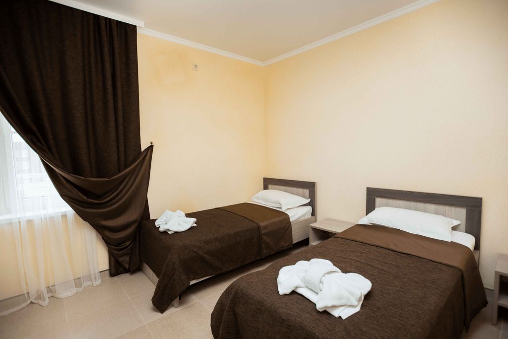 Двухместный номер с 2 отдельными кроватями стандарт