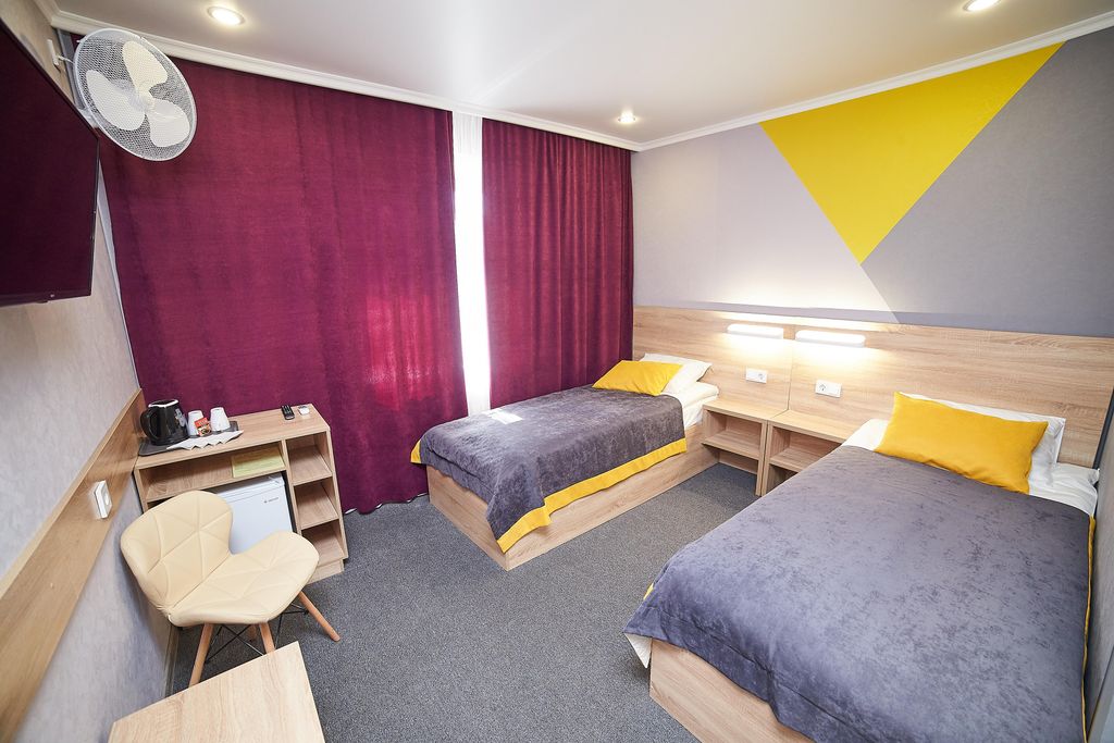 Двухместный номер с 2 отдельными кроватями улучшенный с видом на город