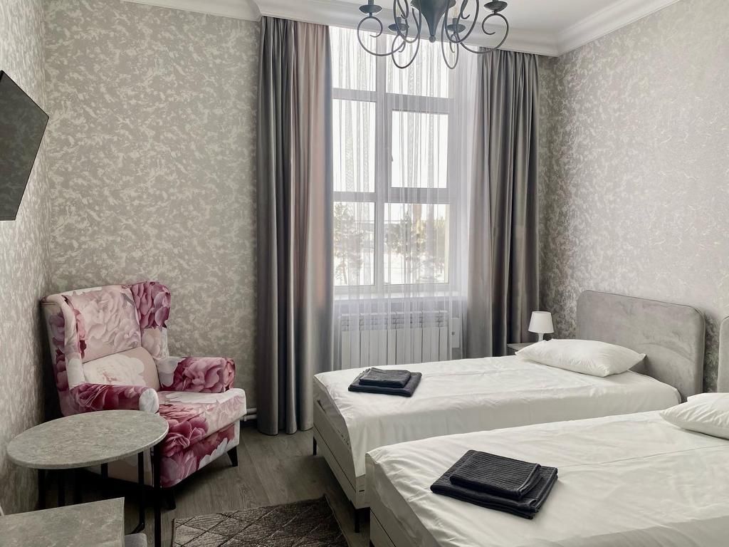 Двухместный номер с 2 отдельными кроватями стандарт