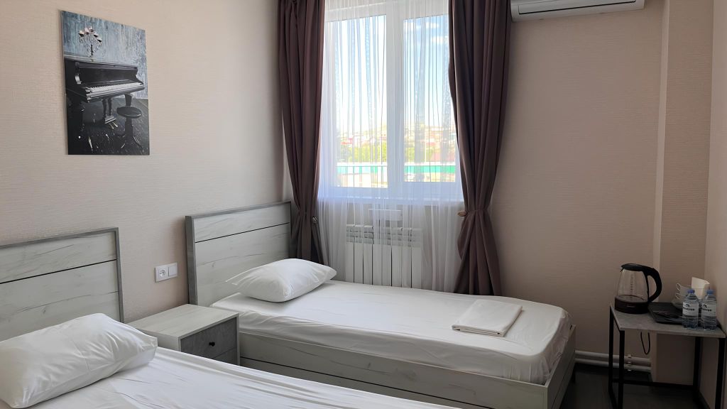 Двухместный номер с 2 отдельными кроватями эконом