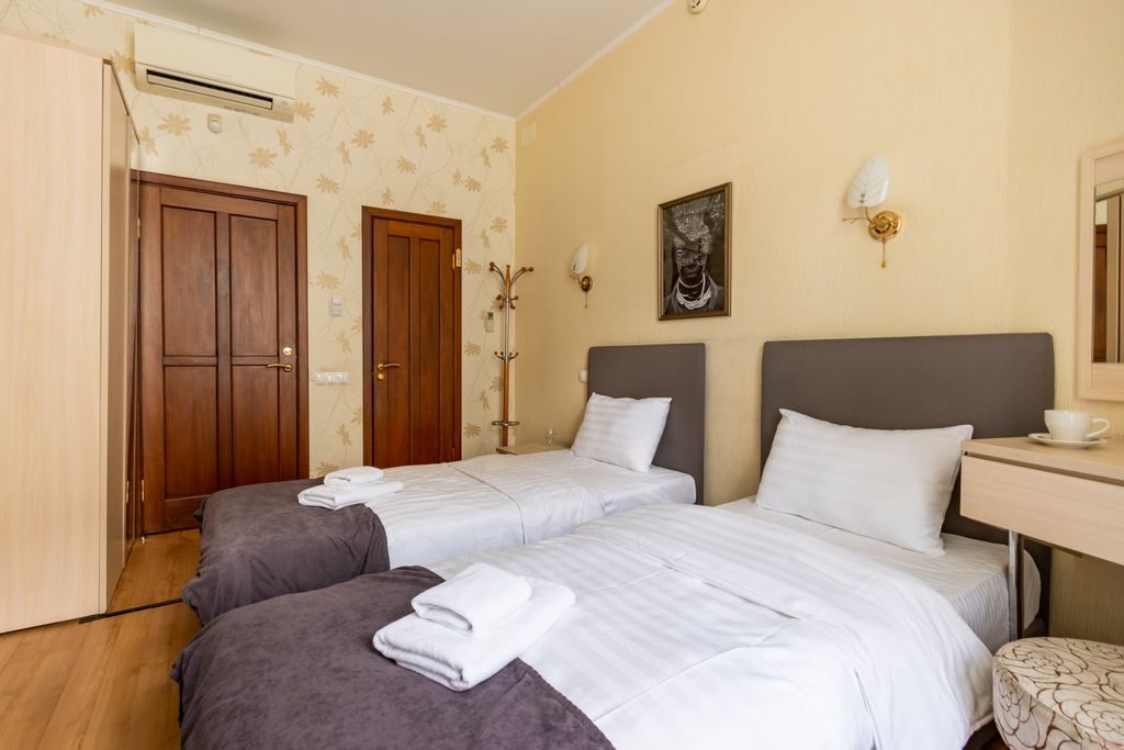 Двухместный номер с 2 отдельными кроватями улучшенный