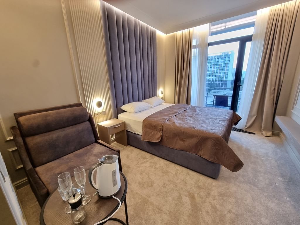 Трёхместный номер с видом на море