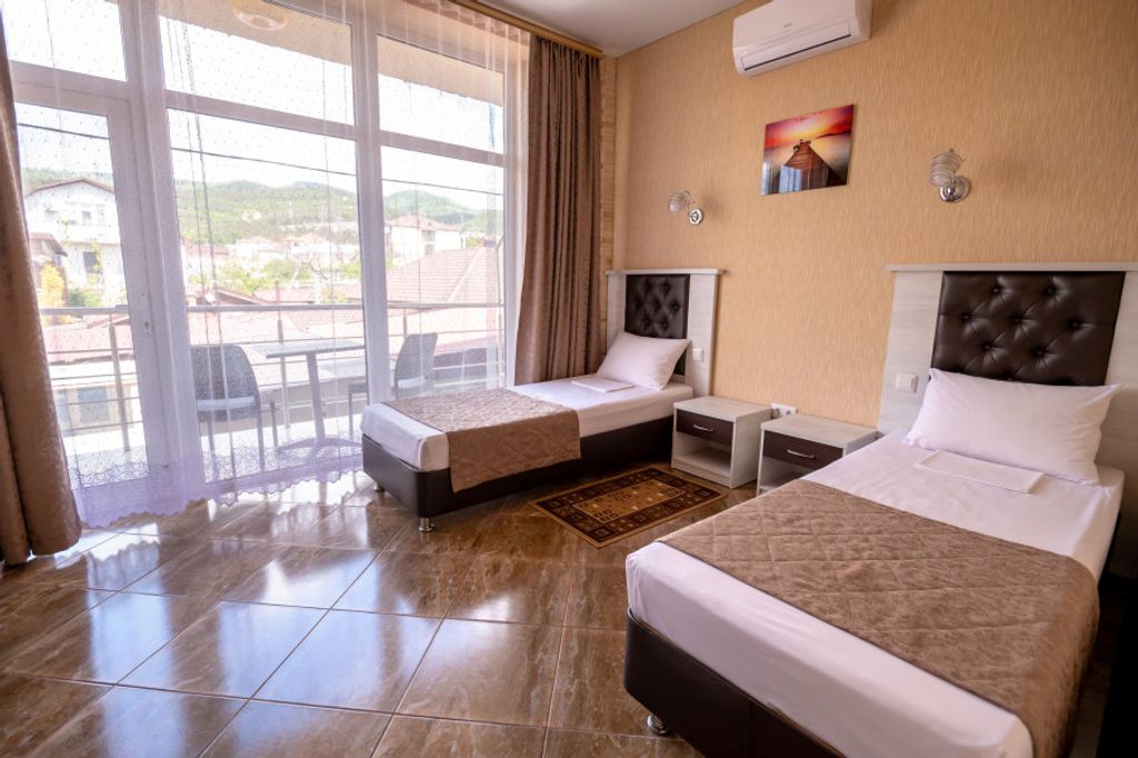 Двухместный номер с 2 отдельными кроватями стандарт