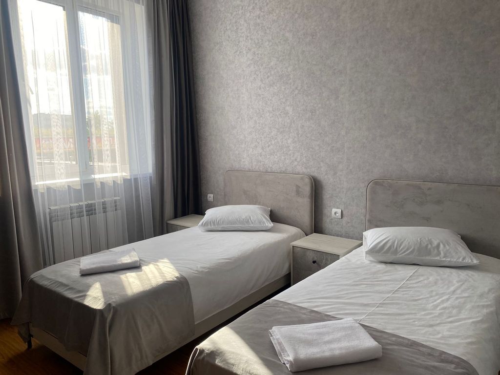 Двухместный номер с 2 отдельными кроватями стандарт