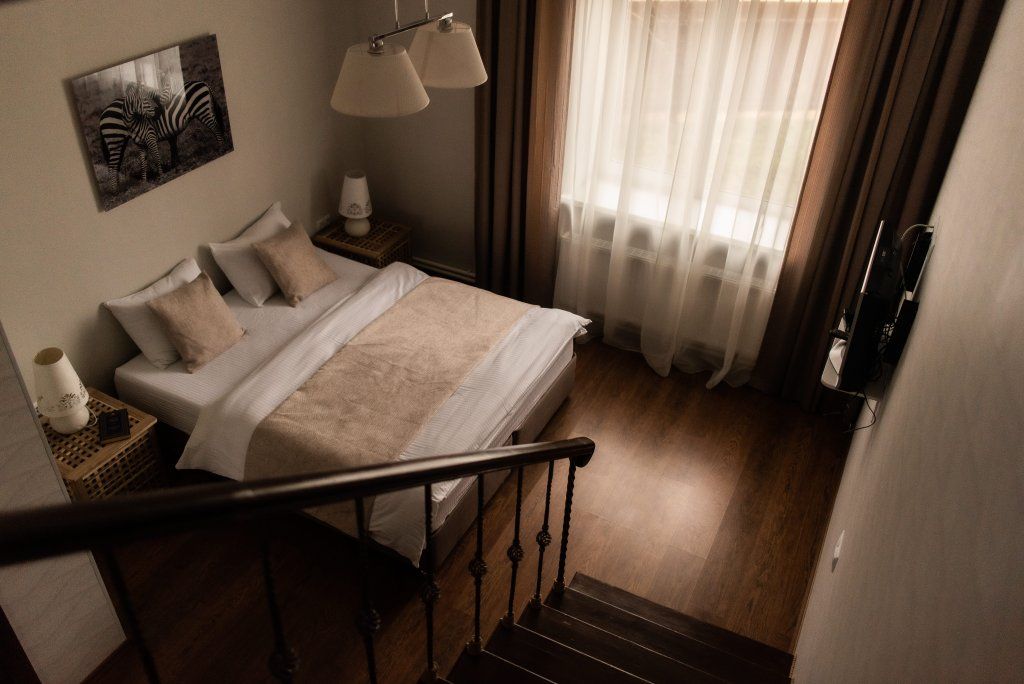 Четырёхместный номер двухэтажные апартаменты