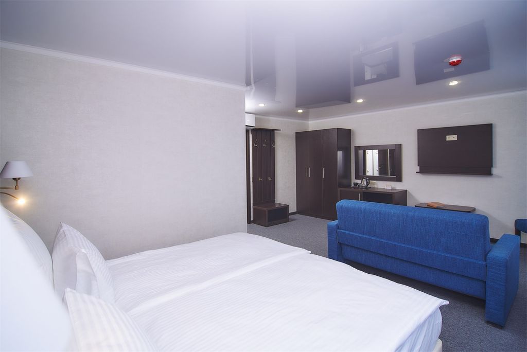 Двухместный номер с 1 кроватью или двумя отдельными джуниор сюит