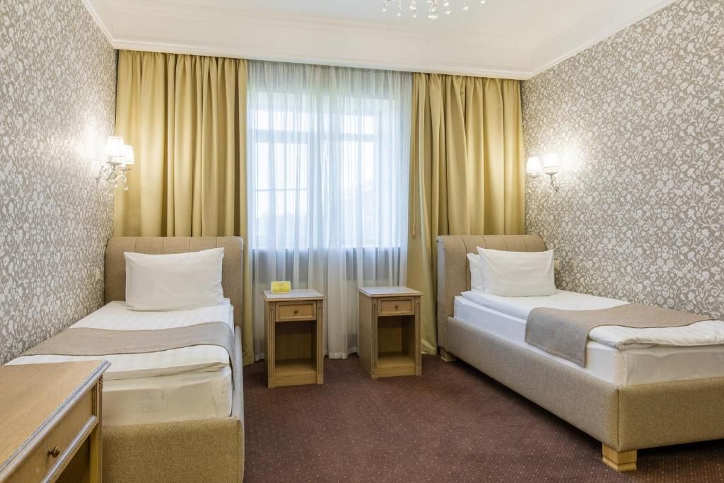 Двухместный номер с 2 отдельными кроватями стандарт без балкона