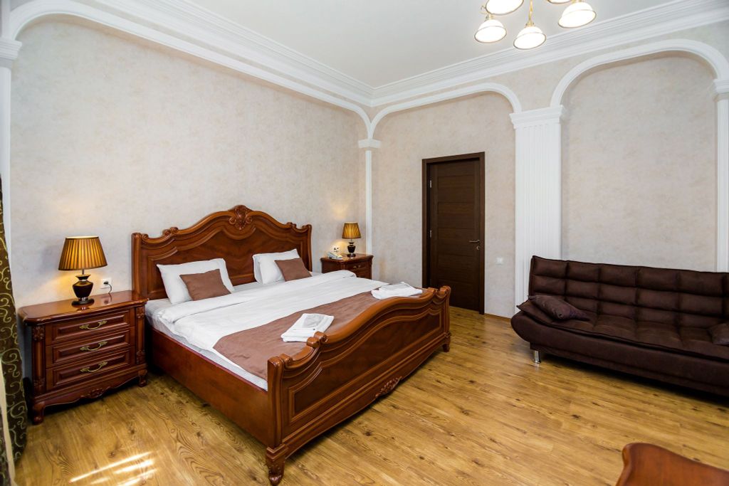 Двухместный номер с 1 кроватью для 2 взрослых и 1 ребенка