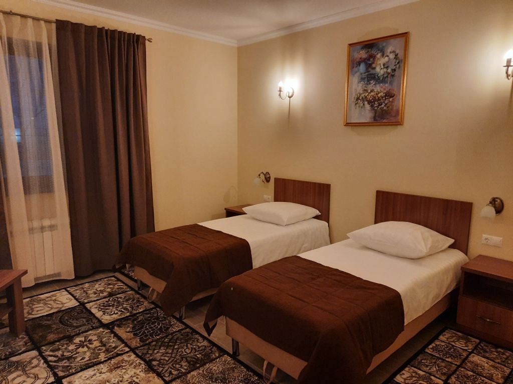 Двухместный номер с 2 отдельными кроватями улучшенный