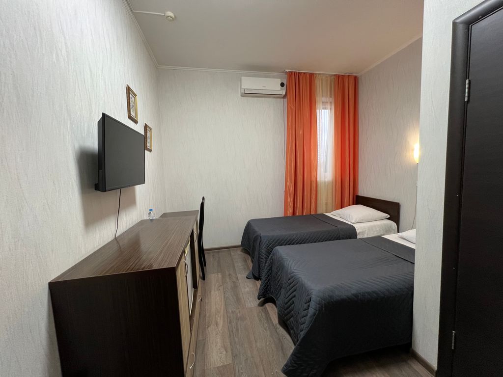 Двухместный номер с 2 отдельными кроватями эконом