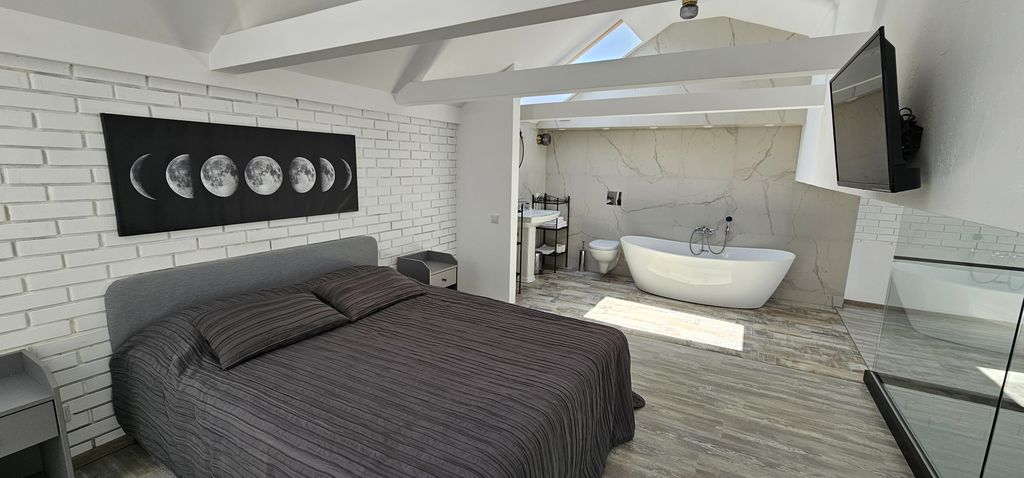 Апартаменты Двухуровневый апартамент с тремя спальнями