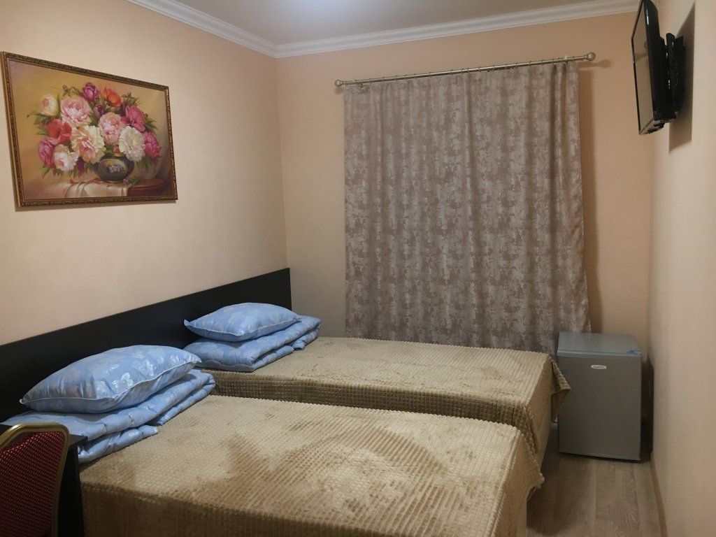 Двухместный номер с 2 отдельными кроватями стандарт