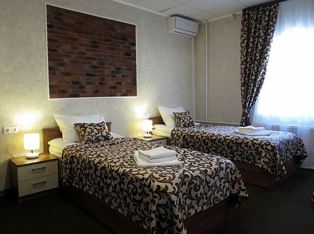 Двухместный номер с 2 отдельными кроватями стандарт