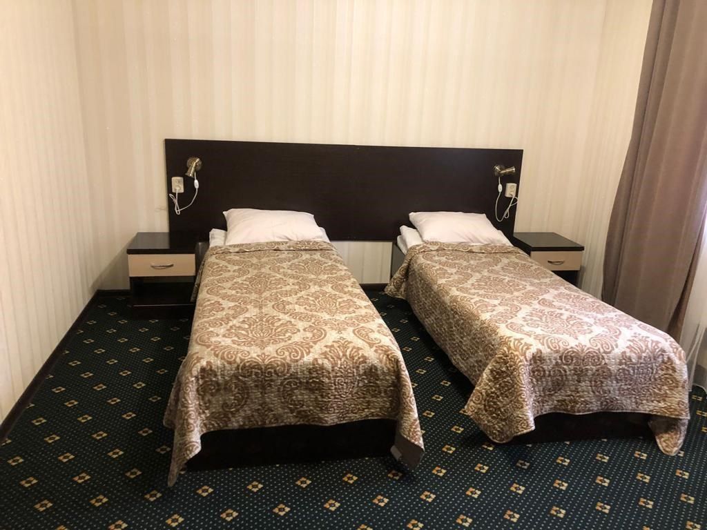 Двухместный номер с 2 отдельными кроватями стандарт