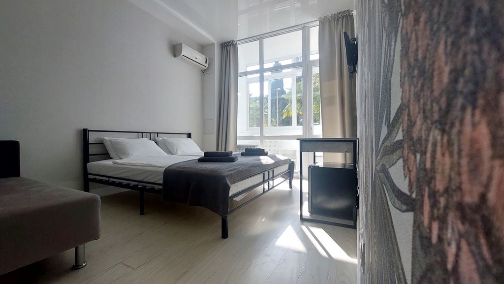 Апартаменты с кроватью кинг-сайз с балконом вид на сад