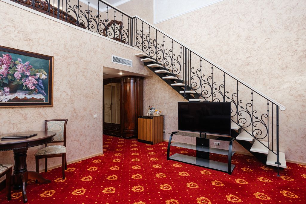 Четырёхместный номер двухуровневый люкс