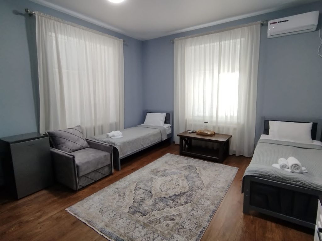 Двухместный номер с 2 отдельными кроватями улучшенный с видом на горы