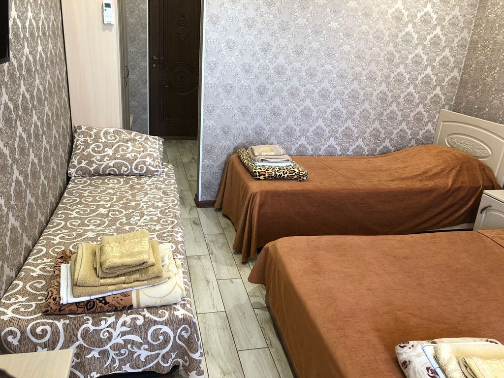 Четырёхместный номер стандарт с балконом