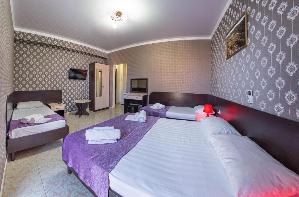 Четырёхместный номер с балконом