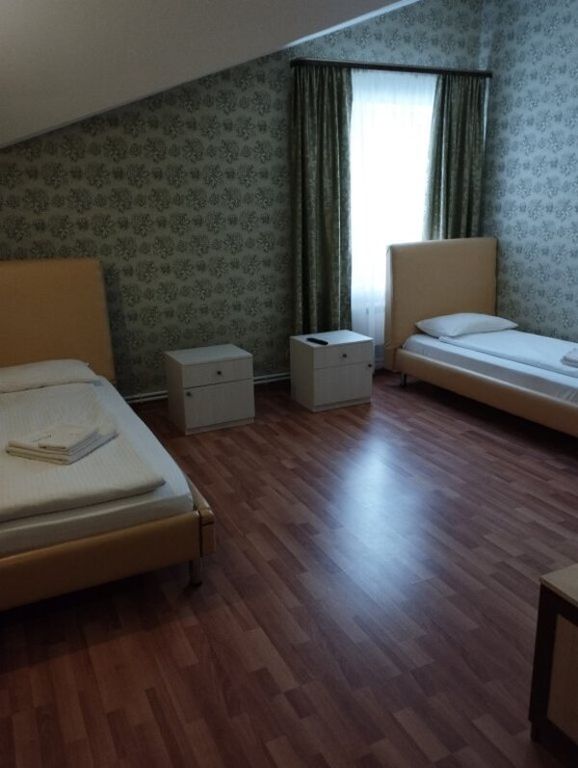 Двухместный номер с 2 отдельными кроватями полулюкс