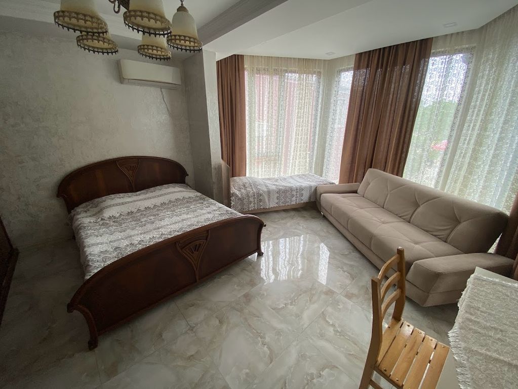 Четырёхместный номер улучшенный с видом на горы