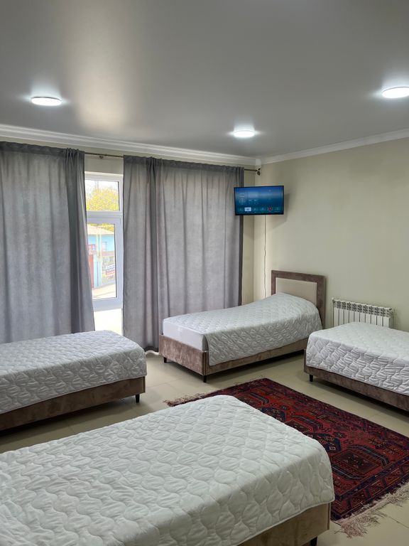 Четырёхместный номер стандарт с видом на горы