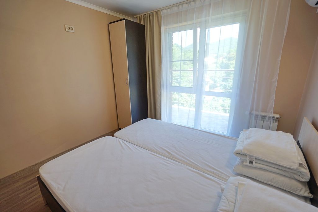 Двухместный номер с 2 отдельными кроватями стандарт