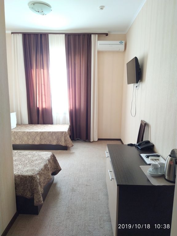 Двухместный номер с 2 отдельными кроватями стандарт