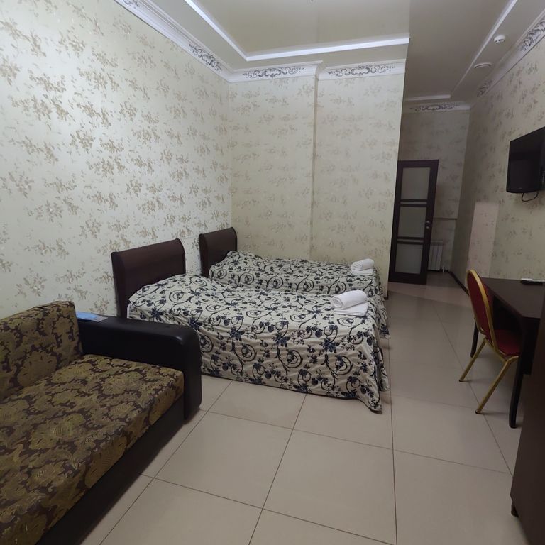 Двухместный номер с 2 отдельными кроватями стандарт