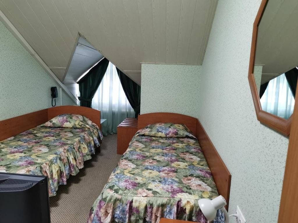 Двухместный номер с 2 отдельными кроватями эконом