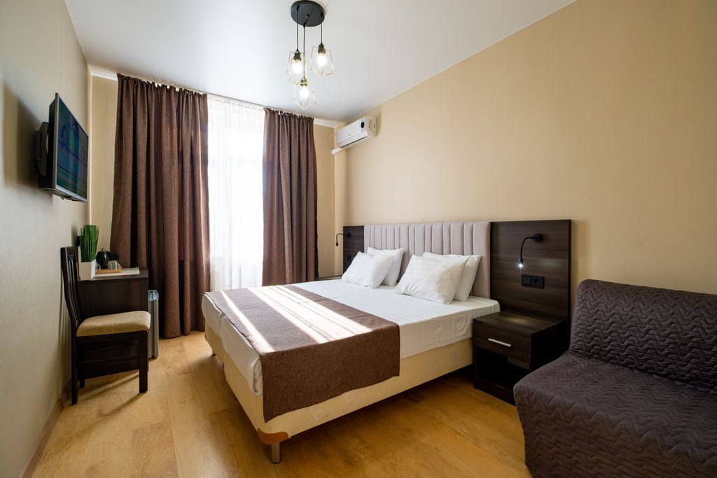 Двухместный номер с 2 отдельными кроватями улучшенный