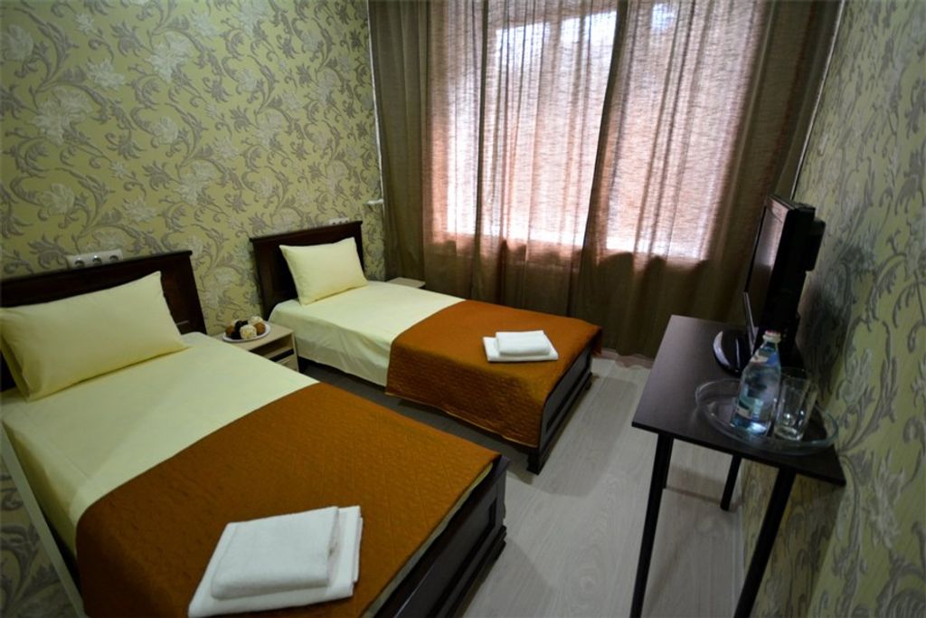 Двухместный номер с 2 отдельными кроватями стандарт