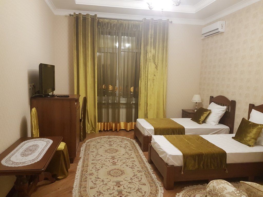 Двухместный номер с 2 отдельными кроватями полулюкс