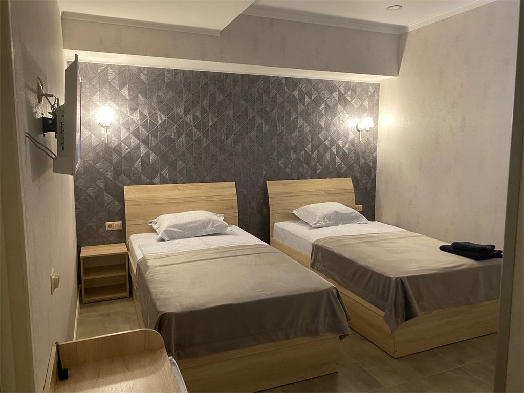 Двухместный номер с 2 отдельными кроватями комфорт