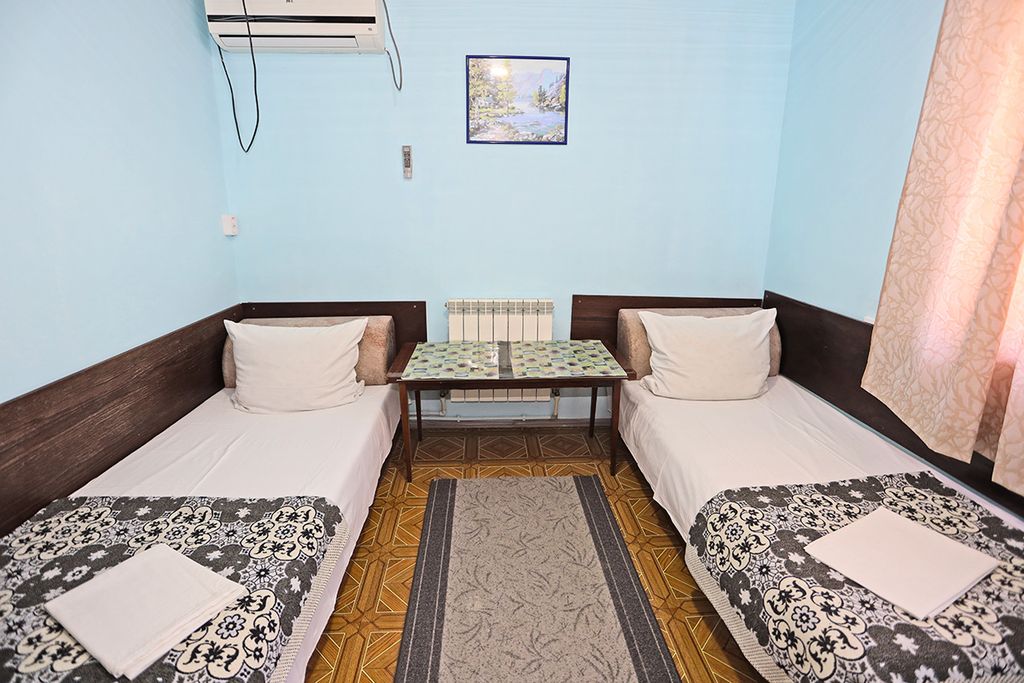 Двухместный номер с 2 отдельными кроватями в блоке с 4-х местным
