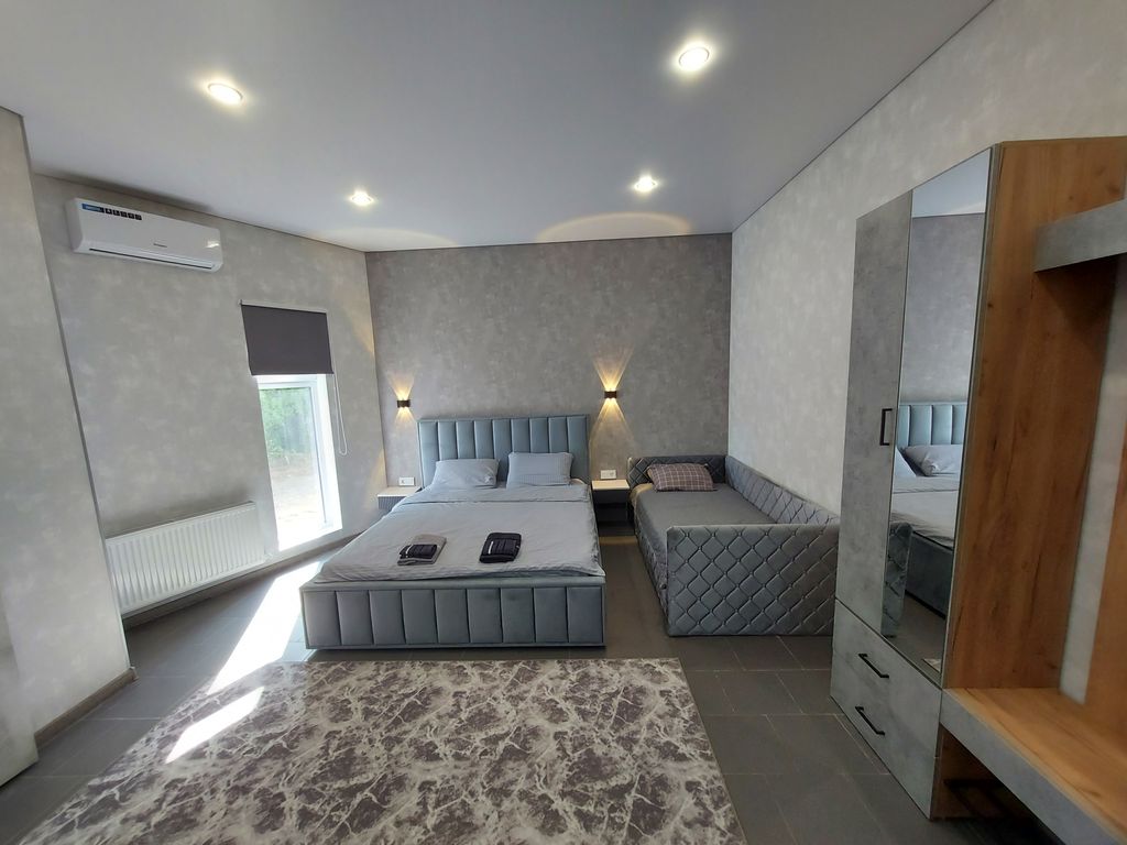 Трёхместный номер люкс