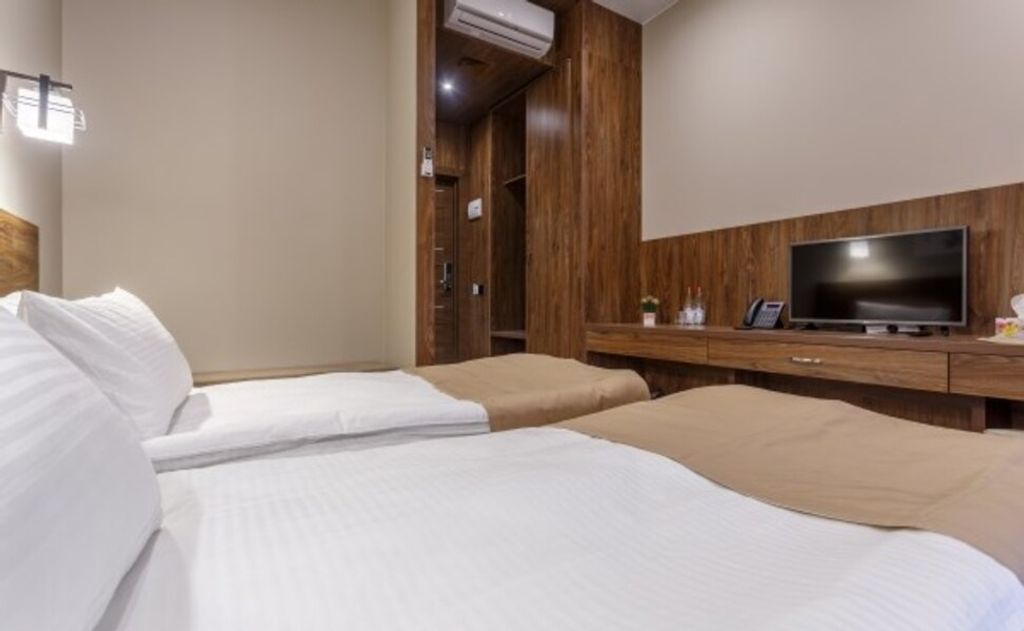 Двухместный номер с 2 отдельными кроватями делюкс