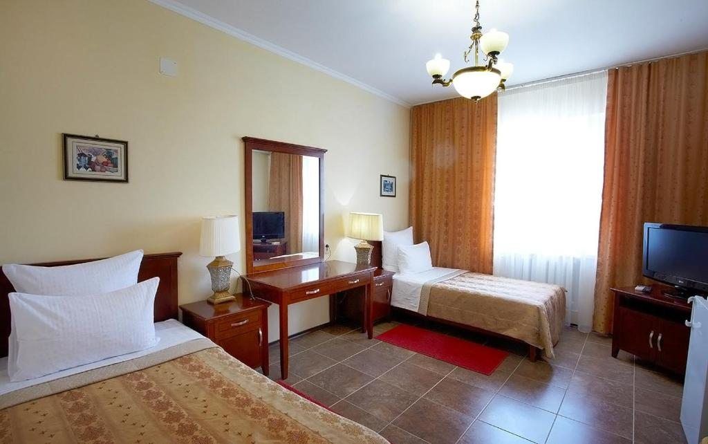 Двухместный номер с 2 отдельными кроватями стандарт