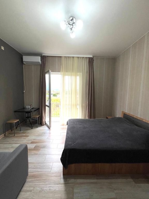 Трёхместный номер улучшенный с видом на горы