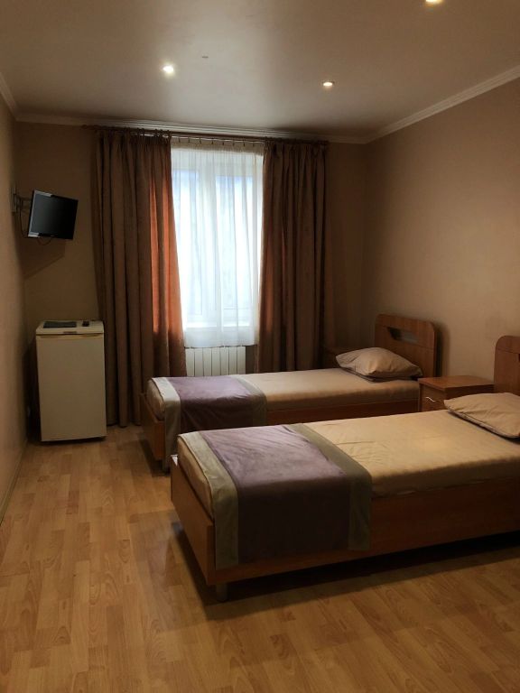 Двухместный номер с 2 отдельными кроватями стандарт 1 комнатный