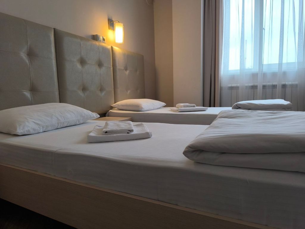 Двухместный номер с 2 отдельными кроватями улучшенный