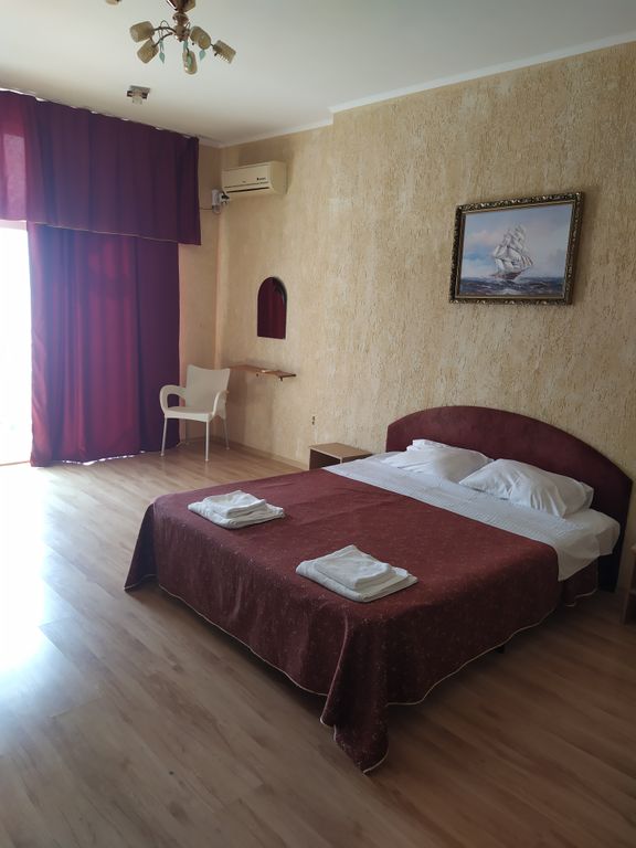 Четырёхместный номер Комната с видом на море