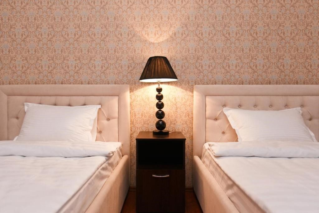 Двухместный номер с 2 отдельными кроватями стандарт