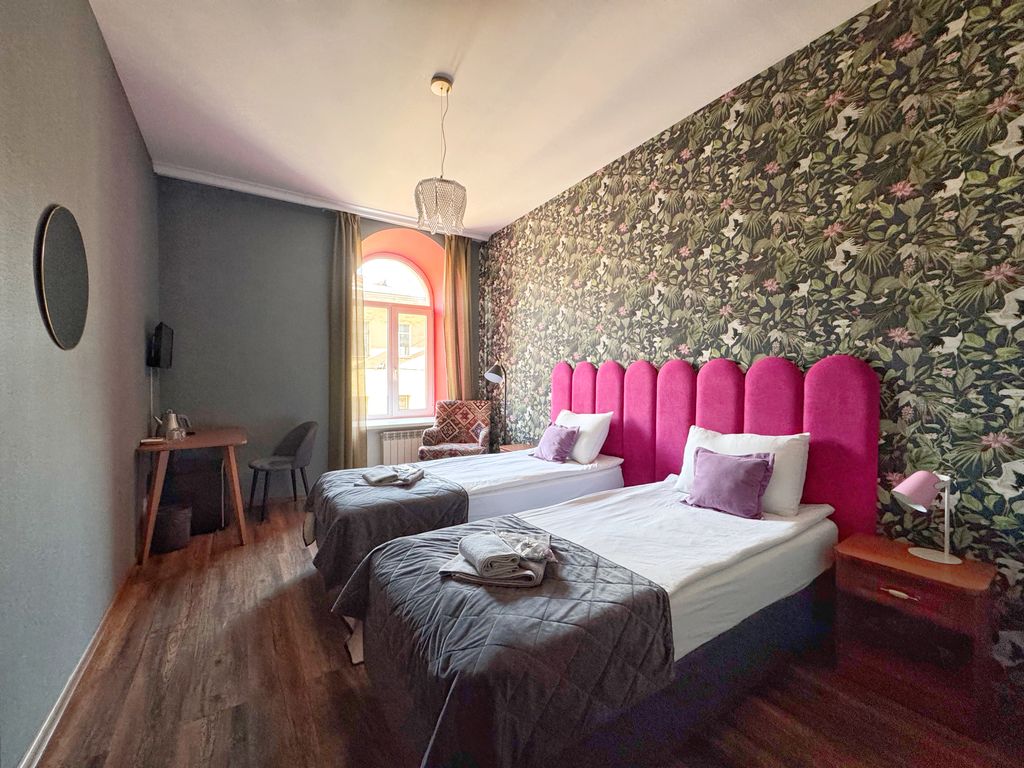 Двухместный номер с 2 отдельными кроватями или c одной двуспальной стандартный и с видом на город